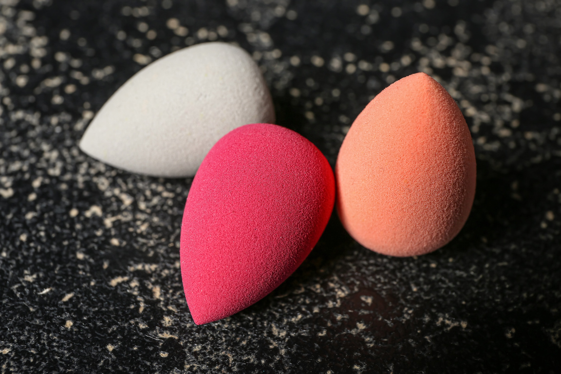 Makeup Sponges on Dark Background, Closeup